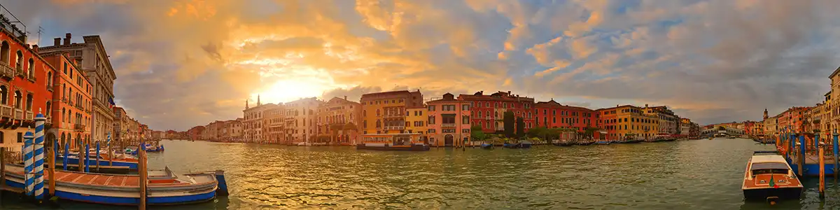 Panoramic photo of the sunset Grand Canal in spring Venice.