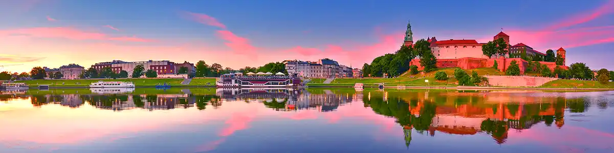 Panoramic photo of the Wawel Royal Castle in summer evening.